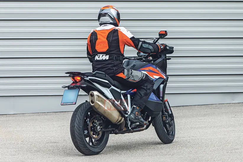 A view of the KTM Super Adventure being taken for a scoot about the block with road-going tires, Ducati Pike Peak style.