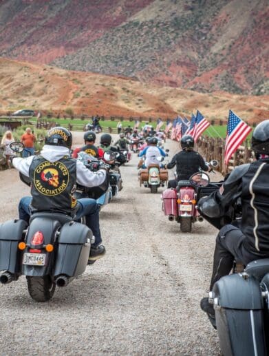 A view of a motorcycle rally that took place in 2021: Many motorcycles ride around as riders reacquaint each other post-COVID