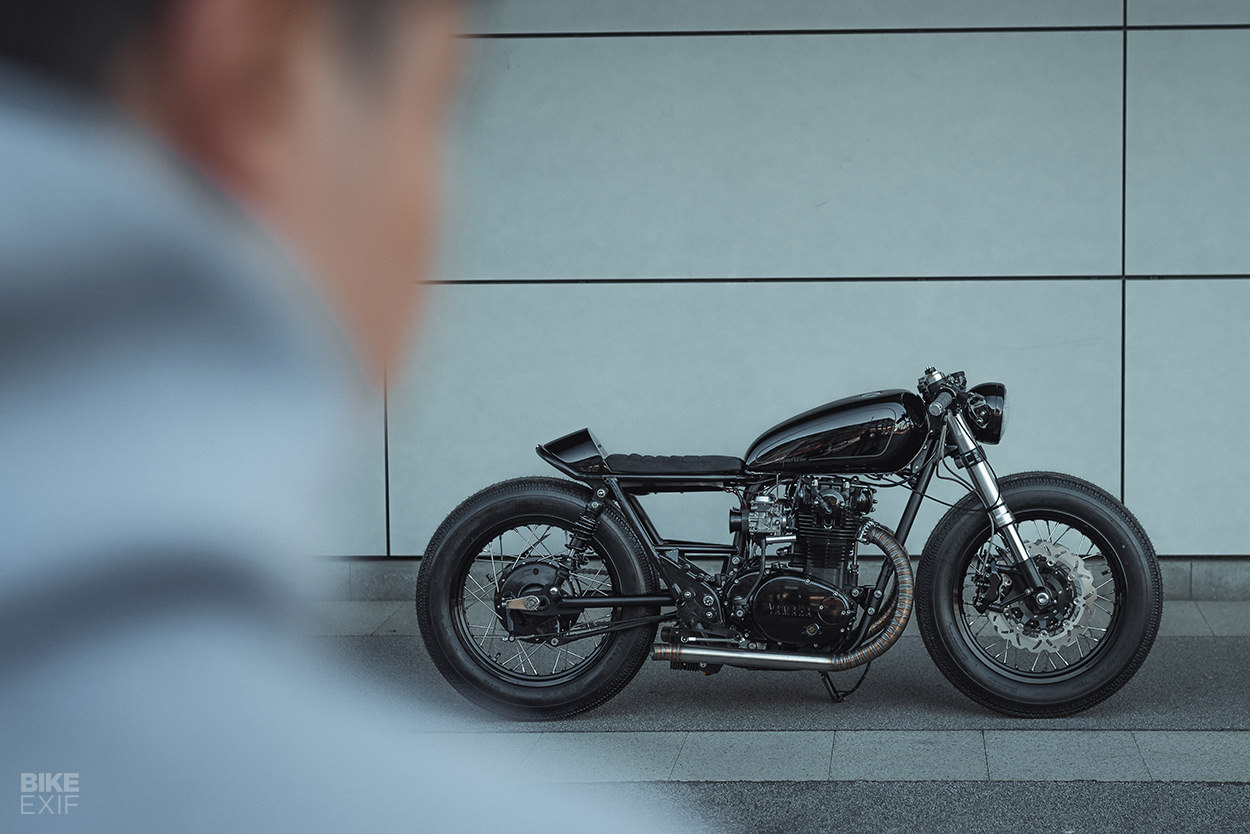 a 1979 Yammie XS650 from custom bike shop Motocrew that features a long, blacked out aesthetic