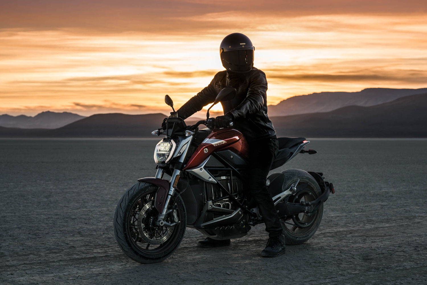 A view of zero motorcycles in a sunset background