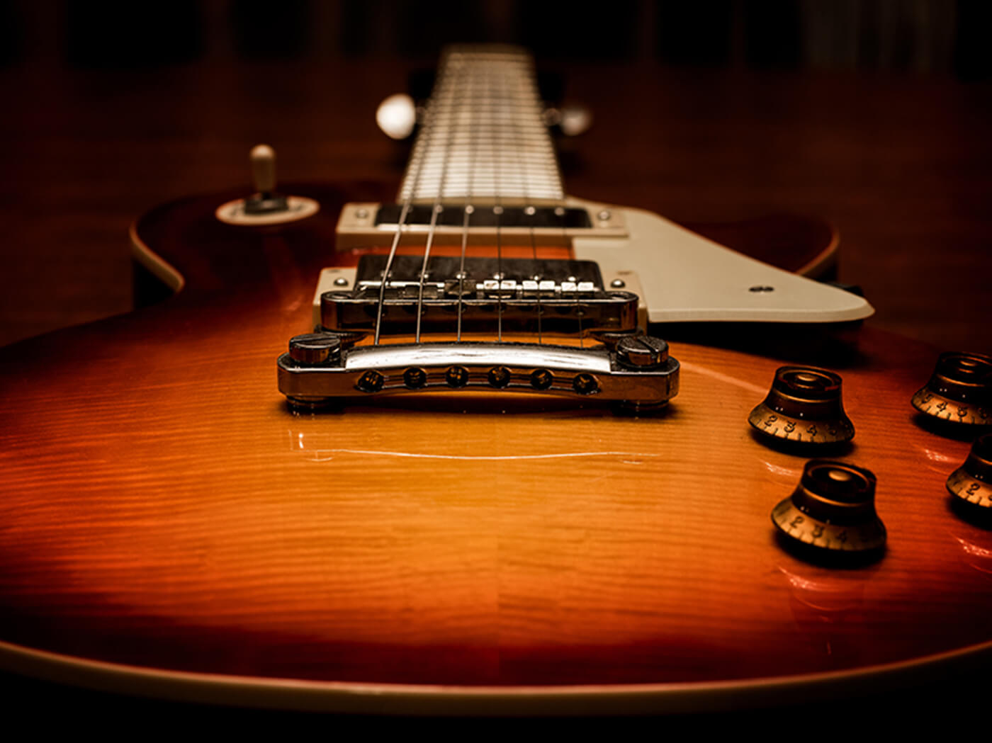 A view of Gibson guitars and triumph adverts in anticipation of an upcoming partnership with Gibson