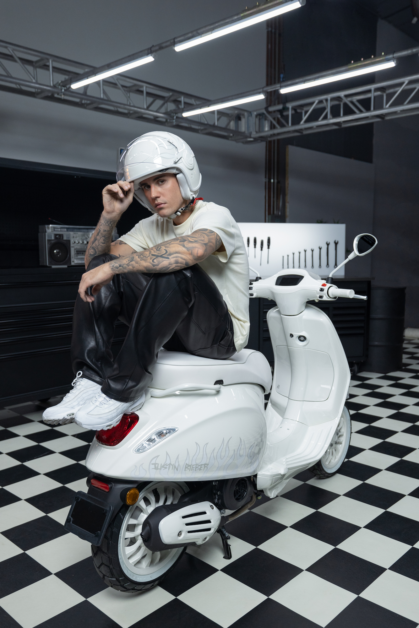 A view of Justin Bieber's recent collaboration with Vespa, including his use of a machine pre-collab