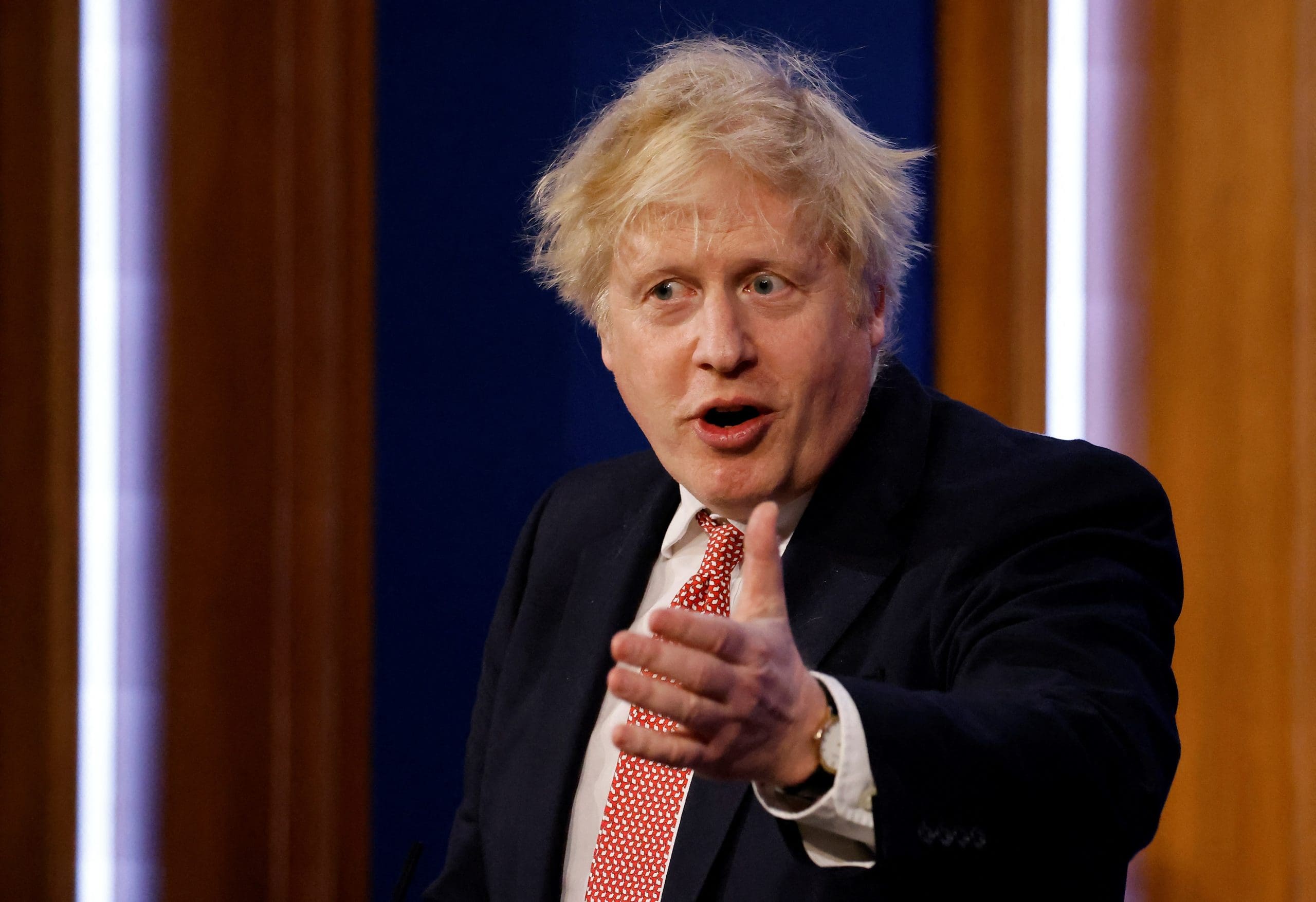 Britain's Prime Minister Boris Johnson answers questions during a press conference