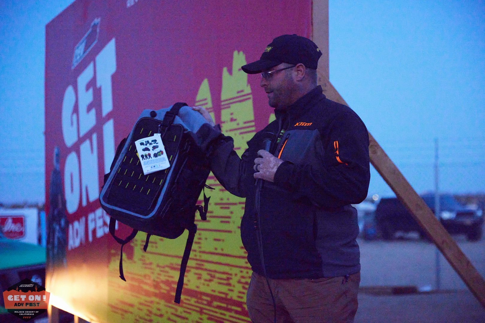 Kyle Bradshaw giving away Rigg Gear at GET ON! Adv Fest Mojave.