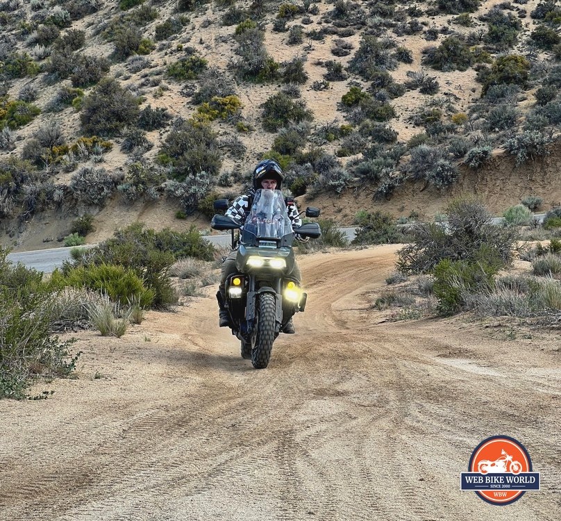 Author's friend Oscar climbing a hill on his Harley Davidson Pan America motorcycle.