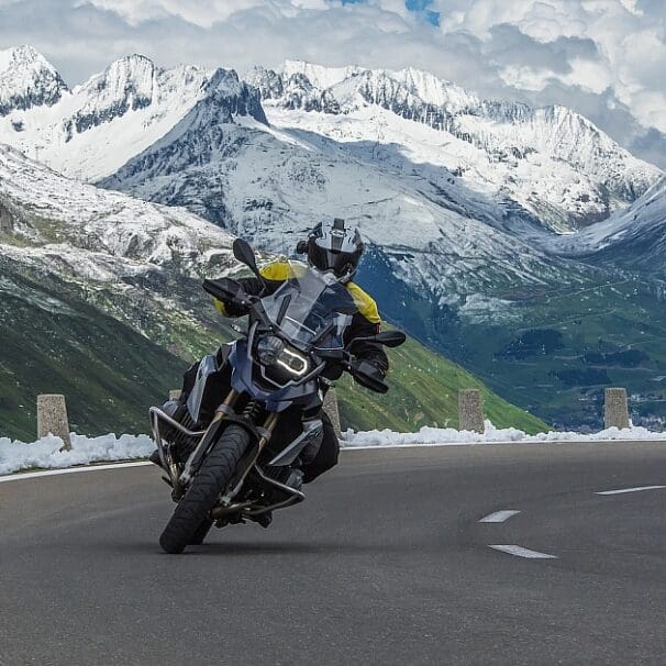 A view of motorcycle riders enjoying nice weather on the road