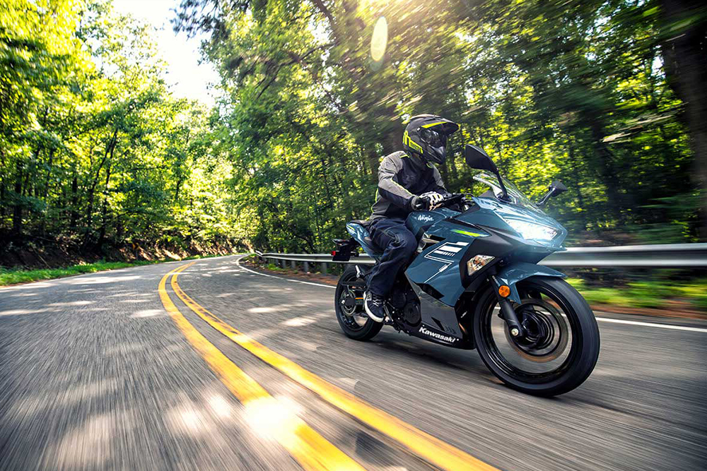 A view of motorcycle riders enjoying nice weather on the road