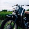 A view of the Honda Cub custom built by Deus Ex Machina Custom Bike Shop