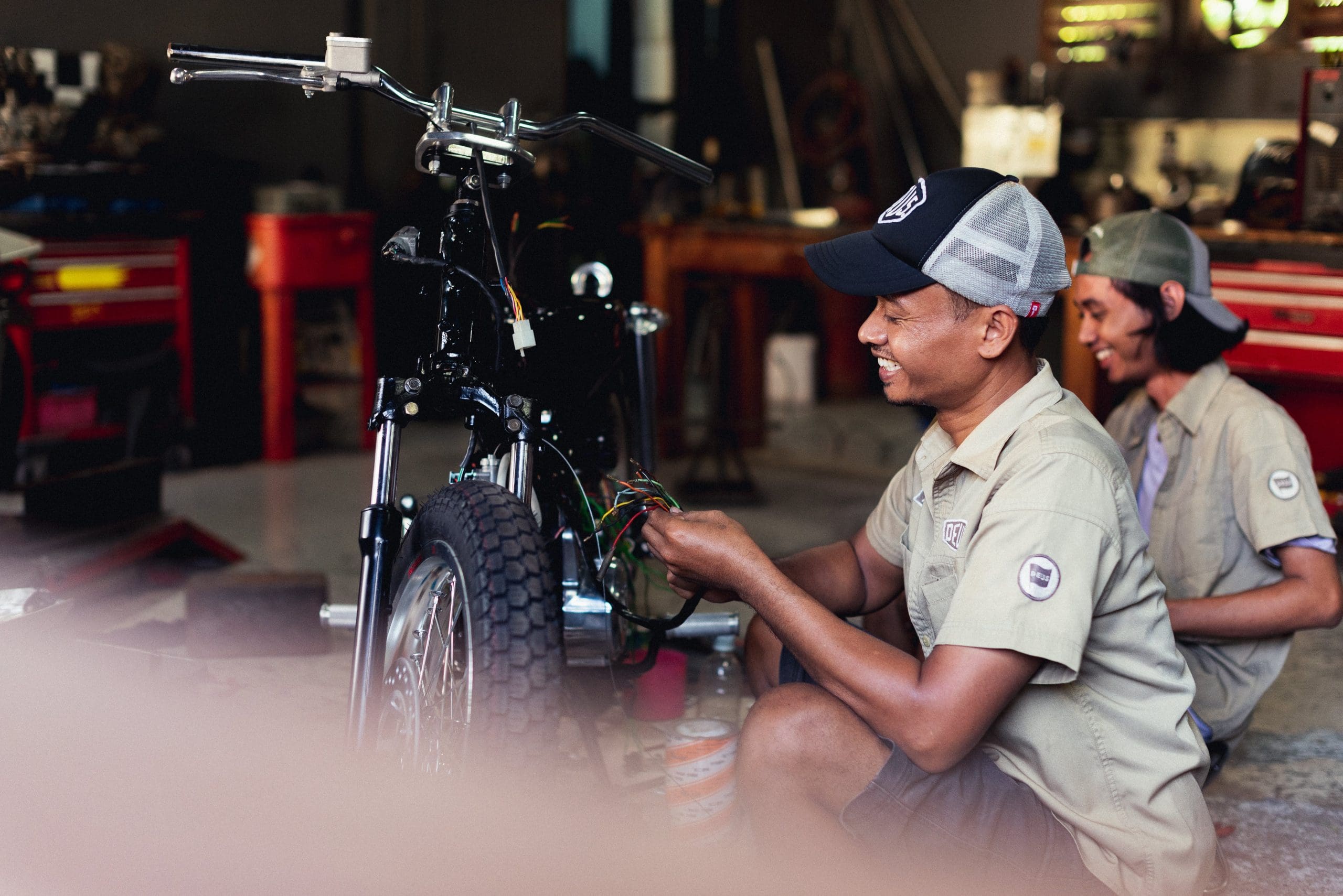 A view of the Honda Cub that was tricked out and refreshed by iconic custom bike shop Deus Customs