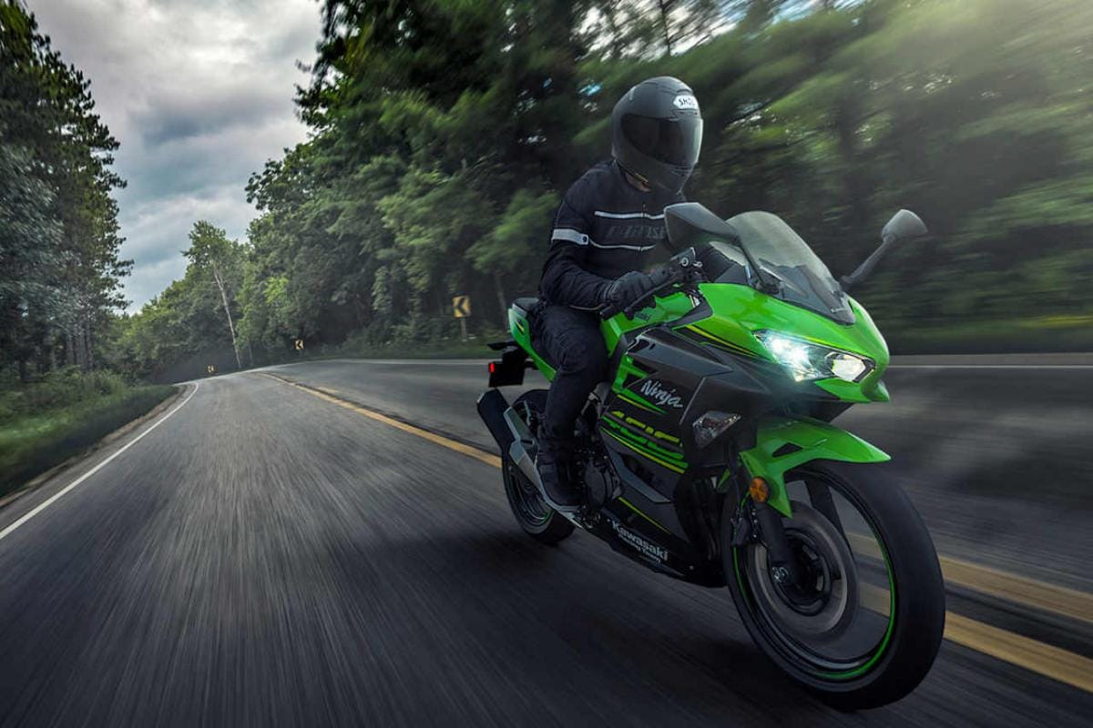A Kawi supersport being ridden on a wet road. Photo courtesy of FirstPost. 