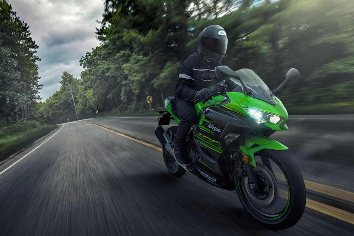 A Kawi supersport being ridden on a wet road. Photo courtesy of FirstPost.
