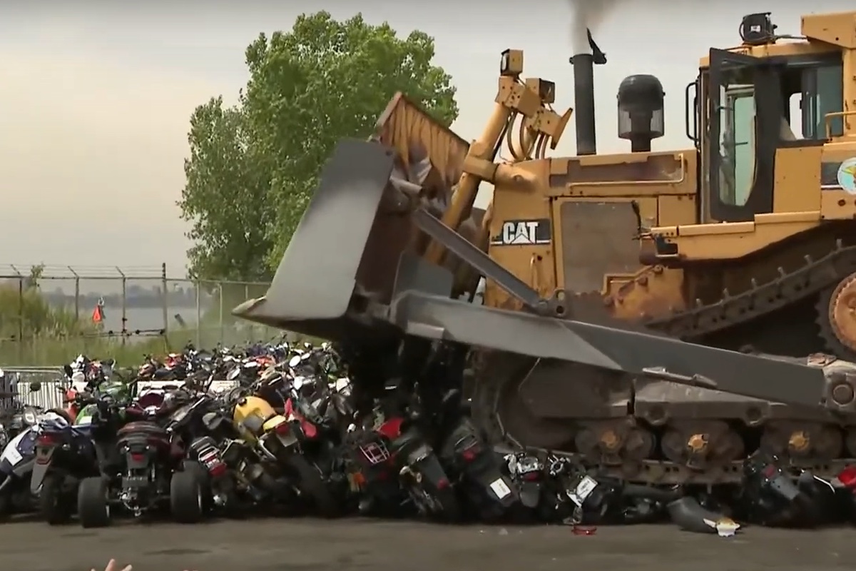 New York's demonstration crushes over 900 bikes confiscated after riders were caught with non road-legal bikes. Photo credited to Gothamist.