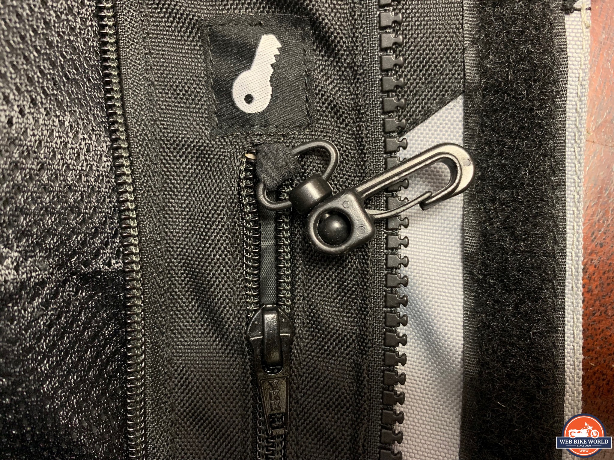 Closeup of zipper pocket and key clip