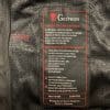 Content and maintenance label on the Gryphon Moto Frontier Jacket