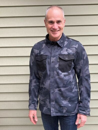 Front view of rider wearing the REV'IT! Tracer Air 2 Overshirt
