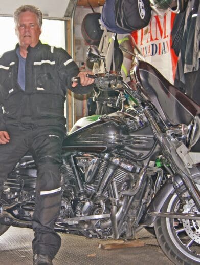 Alan Buller sitting on his motorcycle in the Richa Brutus GTX Jacket