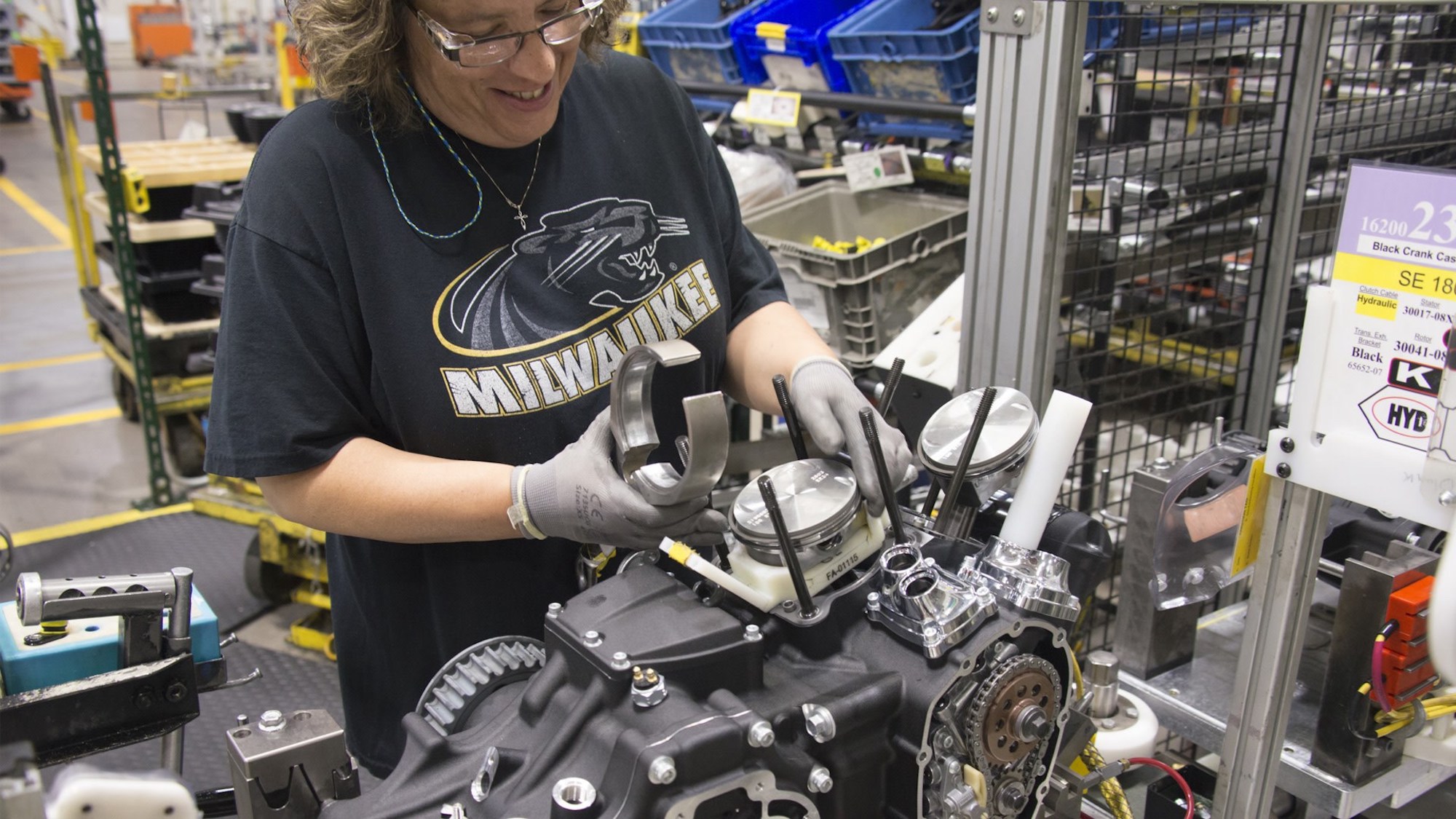 A female production worker tackling the assembly of a Harley bike. Photo courtesy of Visit Milwaukee.