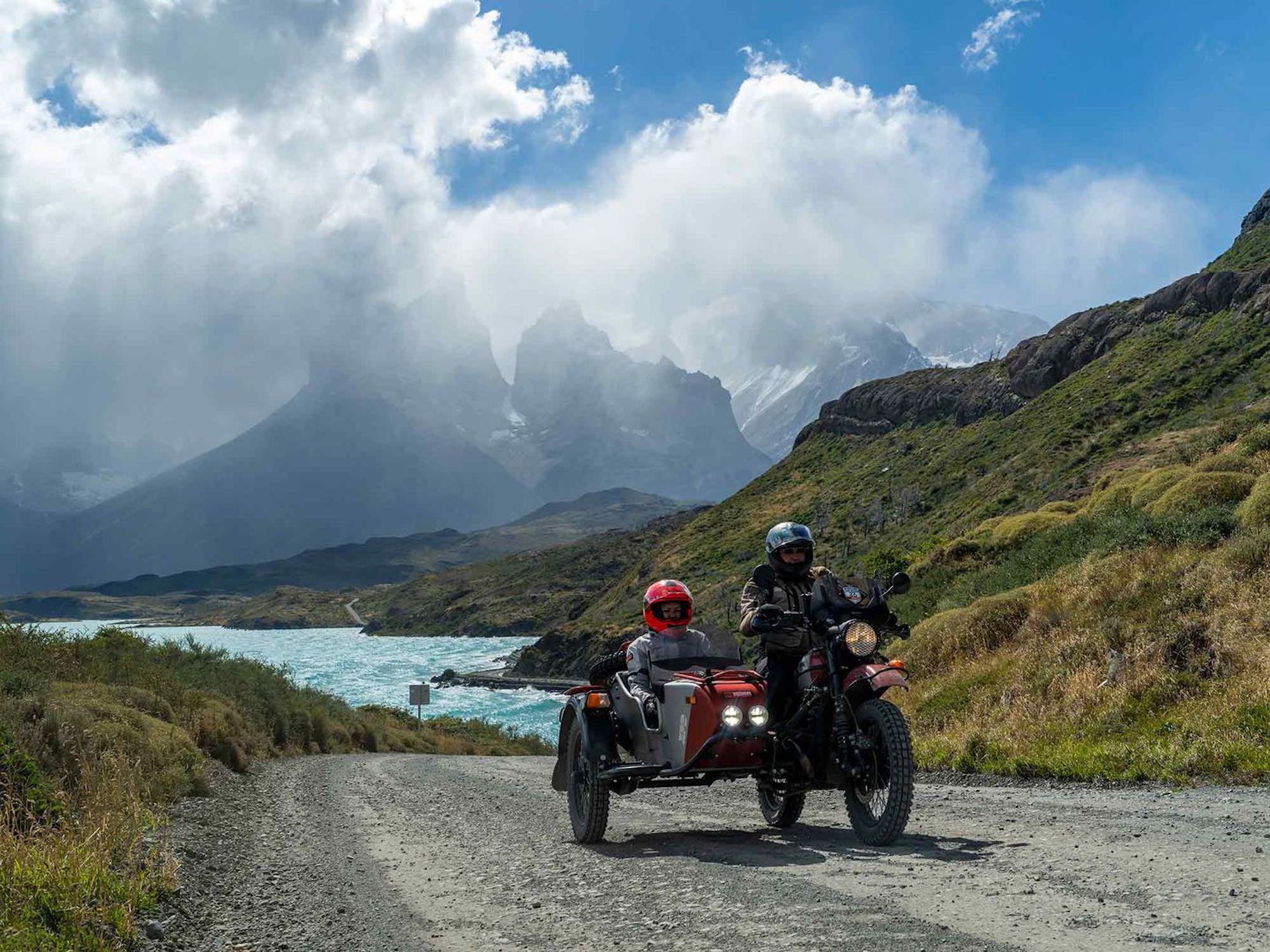 A Ural sidecar motorcycle set against a beautiful background. Media sourced from CycleWorld, via Ural.