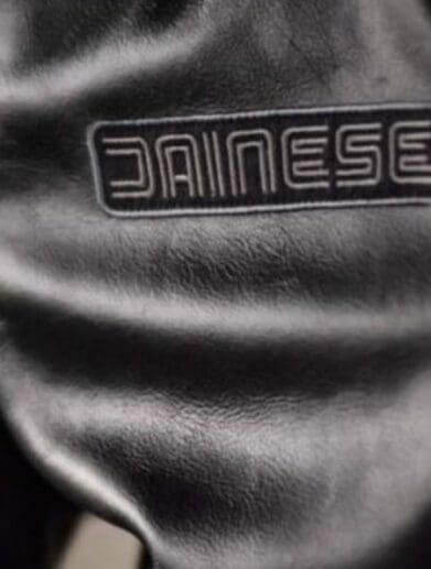 Dainese logo on leather jacket