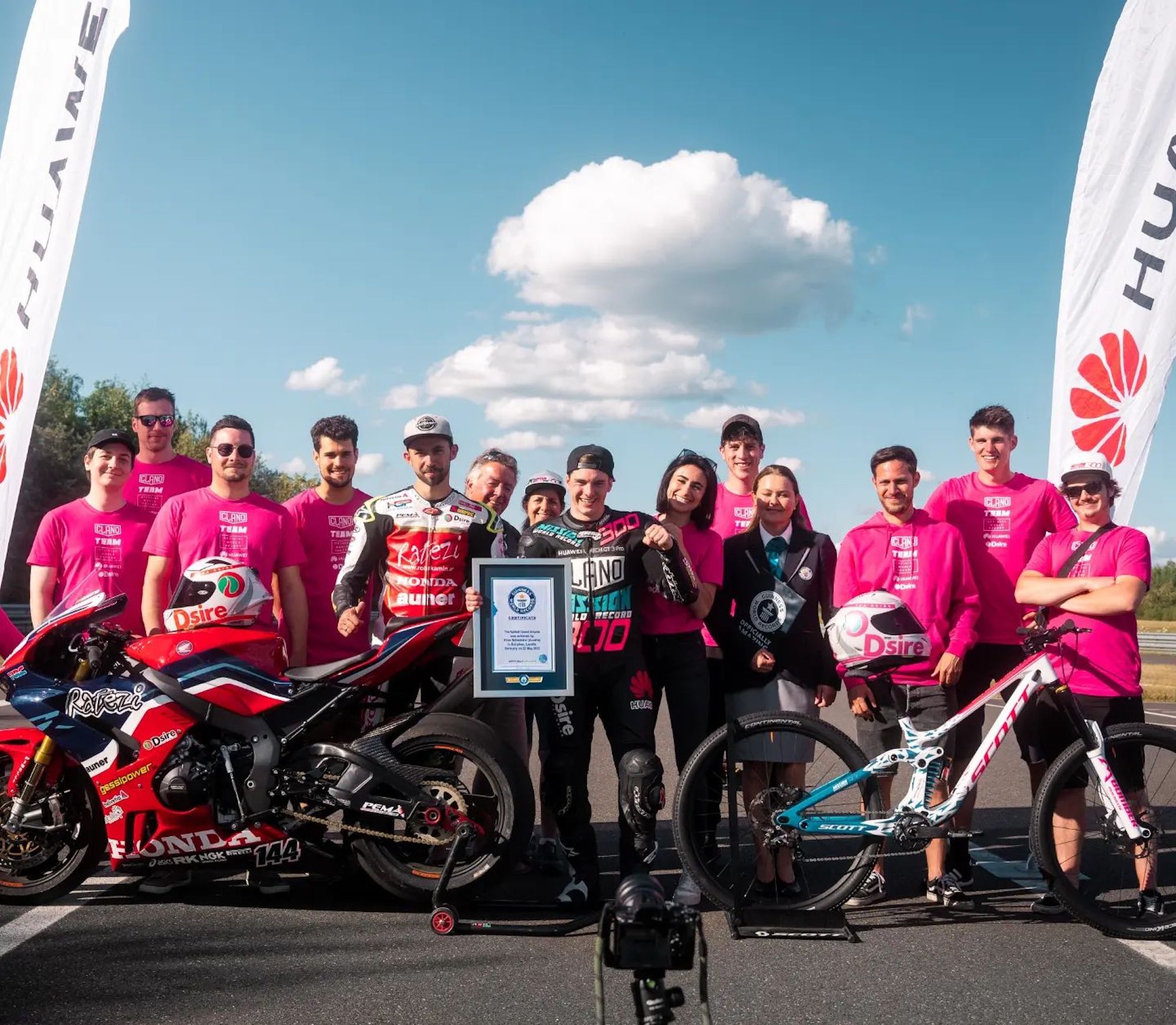 Elias Schwärzler and Geri Gesslbauer cracking the Guiness World Record for 'fastest ever standard bicycle towed by a motorbike.' Media sourced from Elias's Facebook.