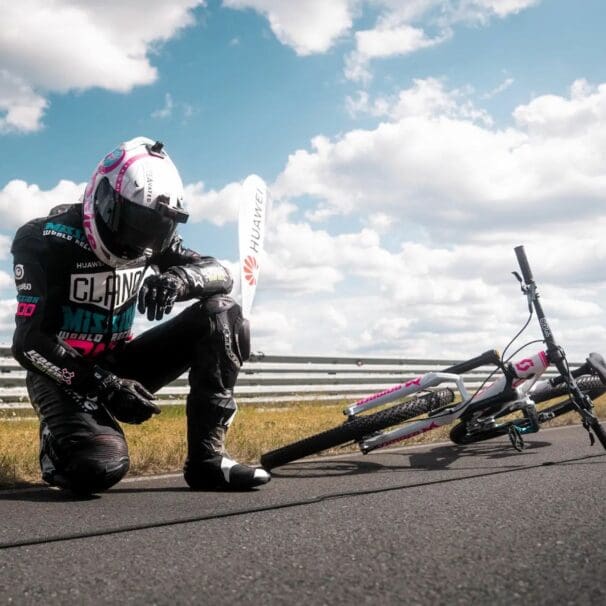 Elias Schwärzler and Geri Gesslbauer cracking the Guiness World Record for 'fastest ever standard bicycle towed by a motorbike.' Media sourced from Elias's Facebook.