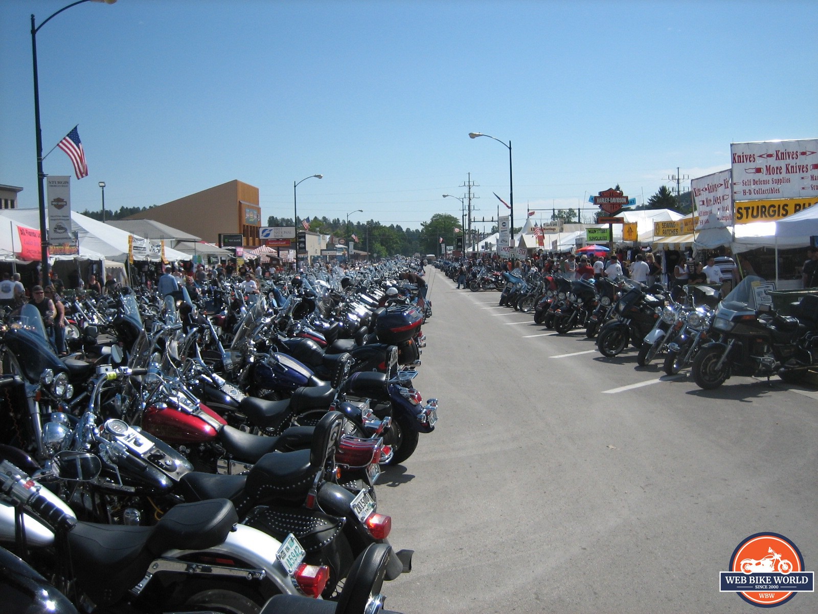 Harley-Davidson and Indian motorcycles parked near each other at Sturgis