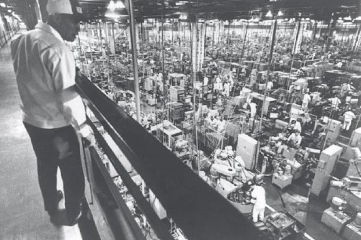 The factory floor of the Honda Suzuka facility, built to only make Super Cubs, in full swing production in 1963
