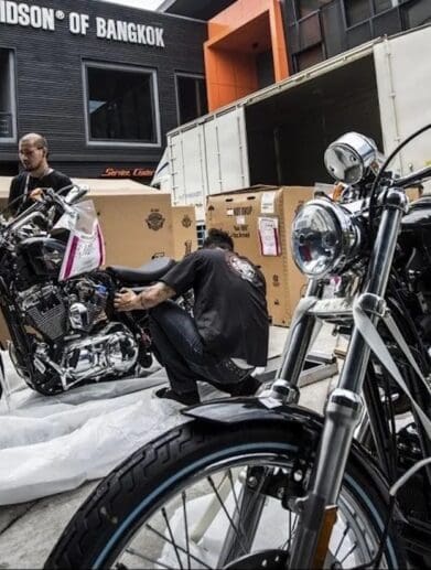 Harley-Davison employees working at a dealership. Media sourced from Hot Cars.