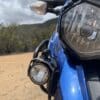 Kenwood STZ-RF200WD Dual Camera System mounted near front headlight of Triumph Tiger Explorer motorcycle