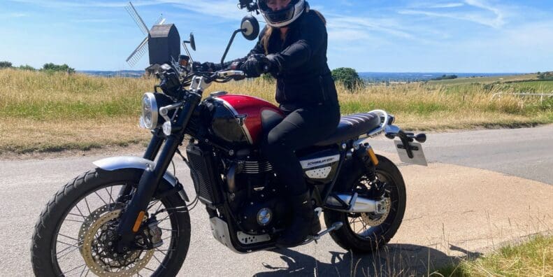 Female rider outdoors on the 2022 Triumph Scrambler 1200 XC