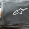 Image showing width of the zipper rear pouch on Alpinestars Halo Drystar Jacket