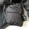 Rain cover placed in side pouch of Alpinestars Halo Drystar Jacket