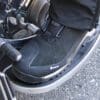 Close-up of REV'IT Pioneer GTX Boots on floorboards of motorcycle