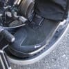 Close-up of REV'IT Pioneer GTX Boots on floorboards of motorcycle