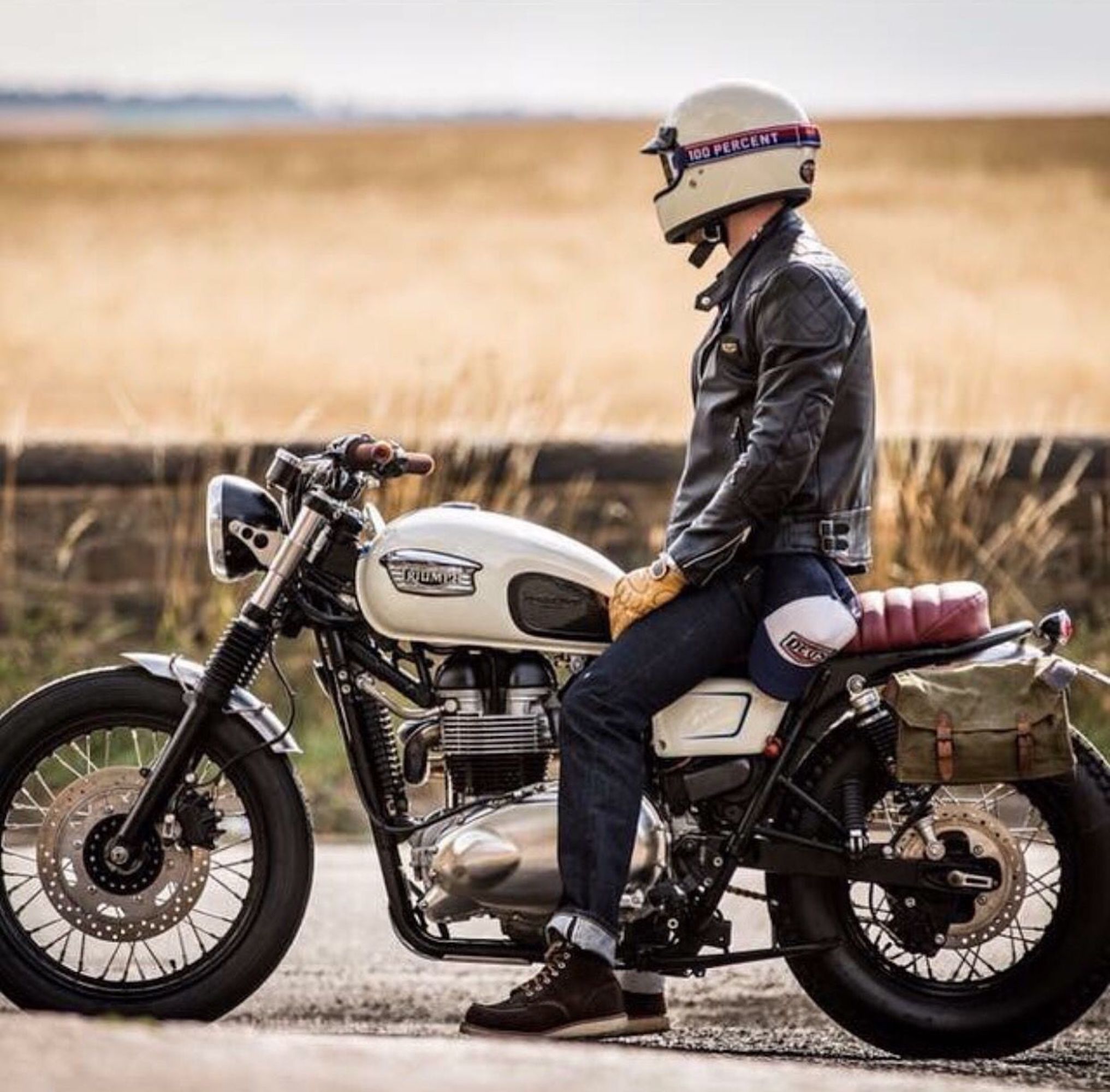 A biker looking out on a field of well-done grass. Media sourced from Daralnahda.