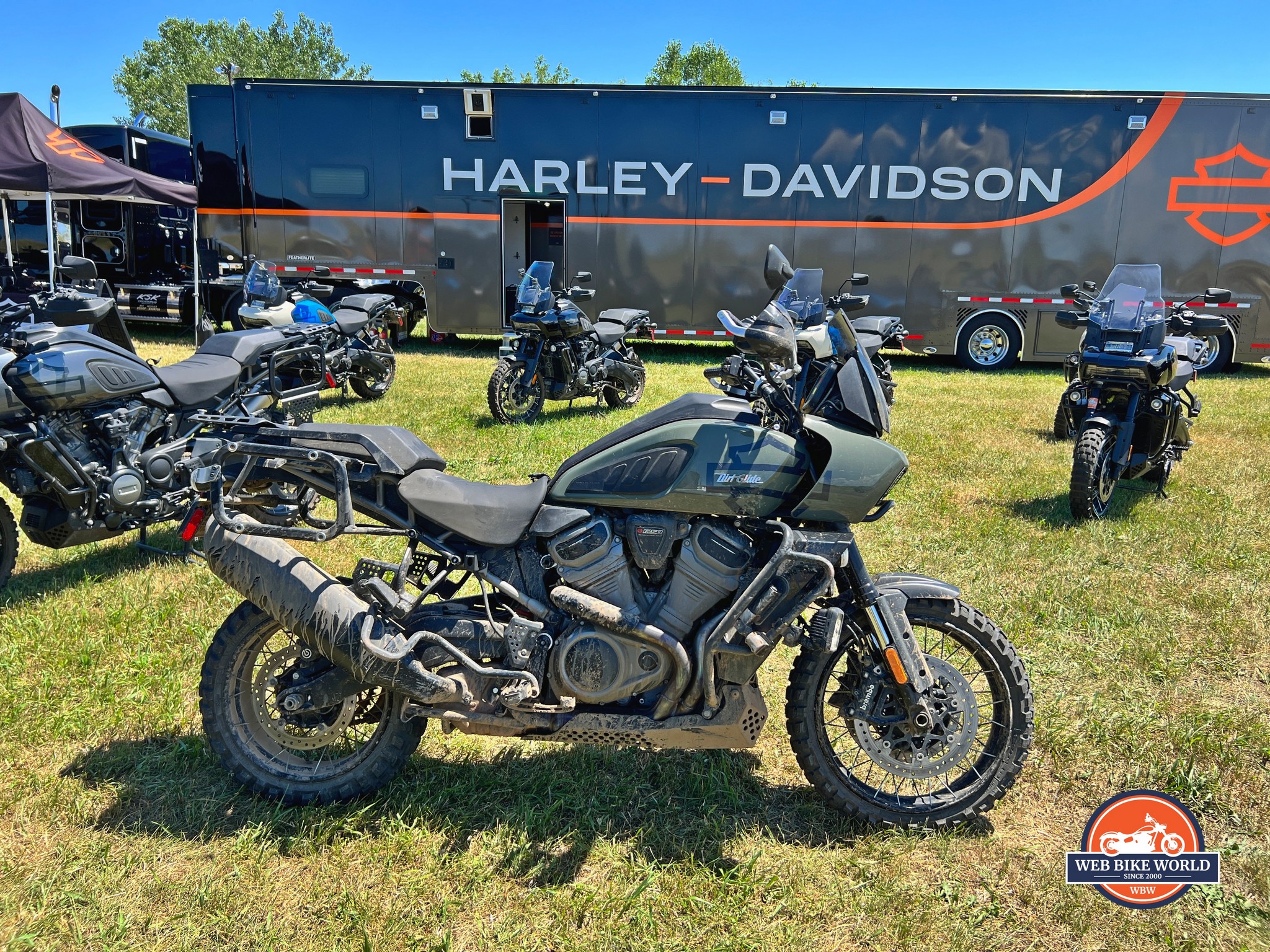 Oscar’s 2021 HD Pan America in front of the demo rides trailer.