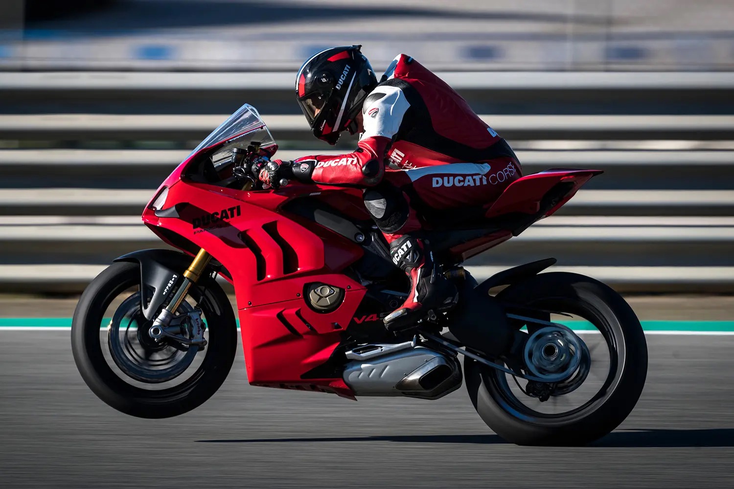 Ducati's racing iteration, enjoying a little wheelie. Media sourced from MCN.