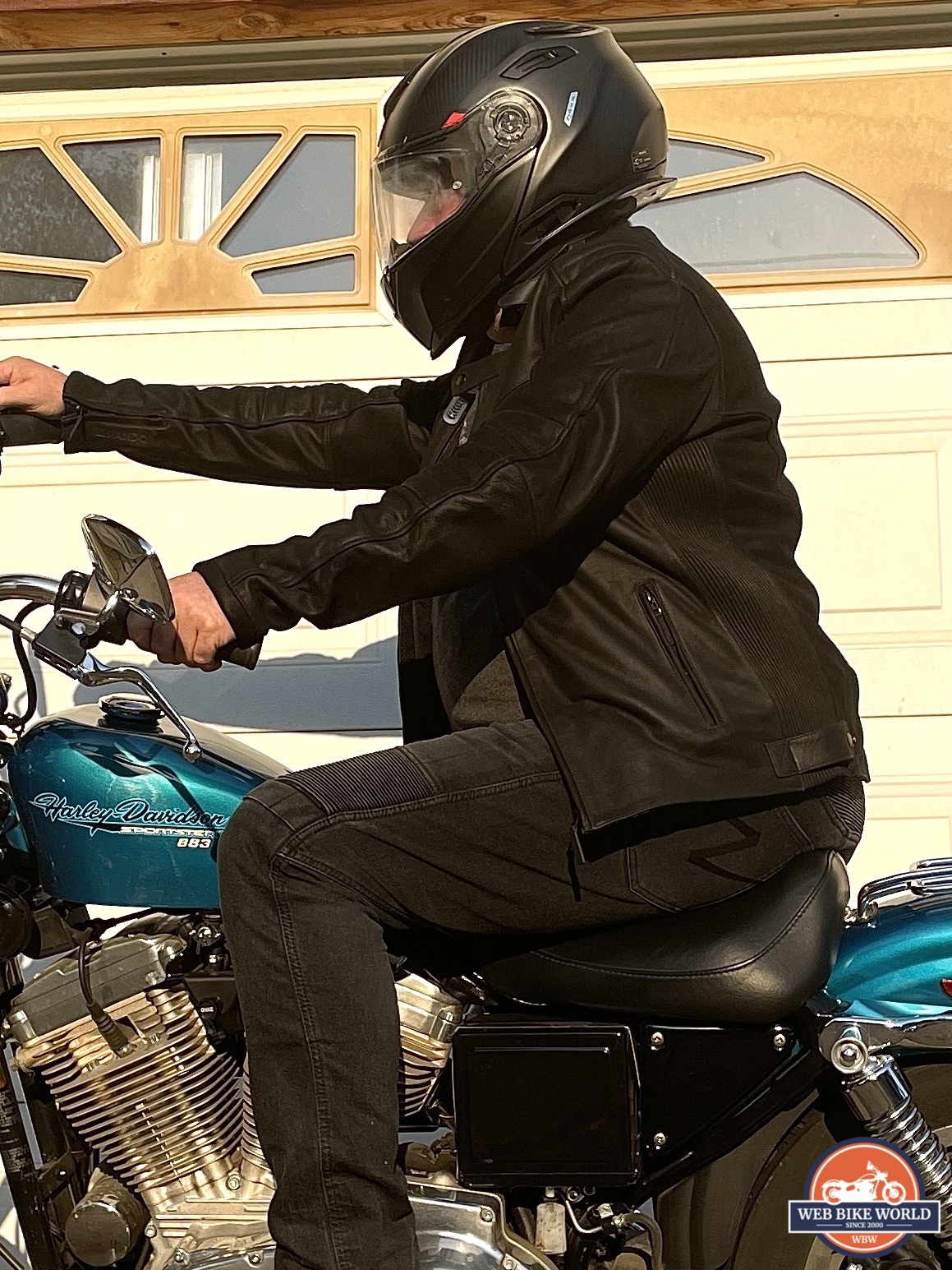 Pando Moto Karl Devil 9 Jeans, Nexx X.Vilitur Carbon Zero Pro Helmet, Pando Moto Tatami LT 01 leather jacket, 1995 Harley Davidson 883 Sportster Hugger