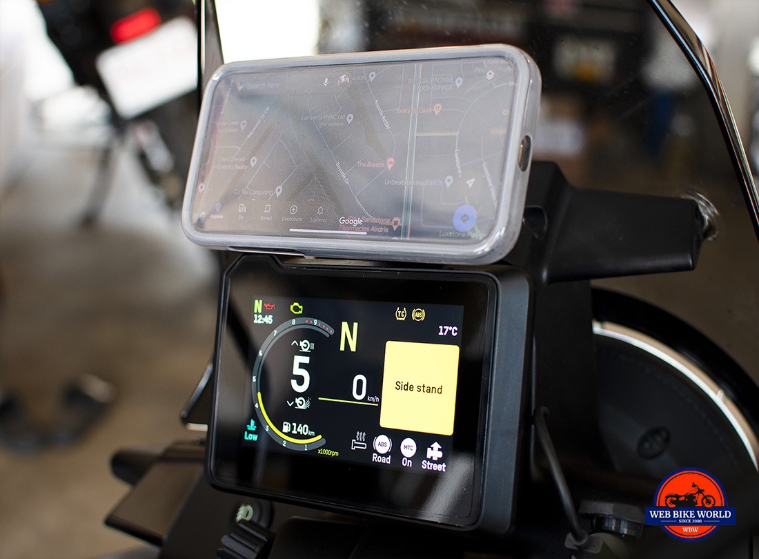 The QuadLock 360 phone poncho installed on my iPhone while attached to the wireless charger head.