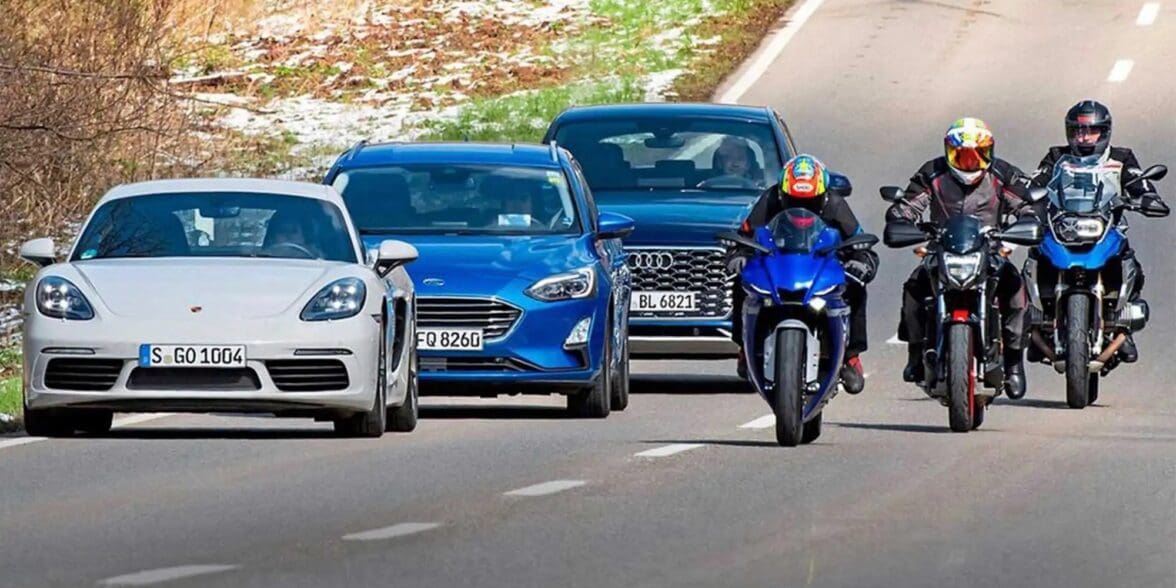 A view of cars driving next to motorcycles. Media courtesy of RideApart.