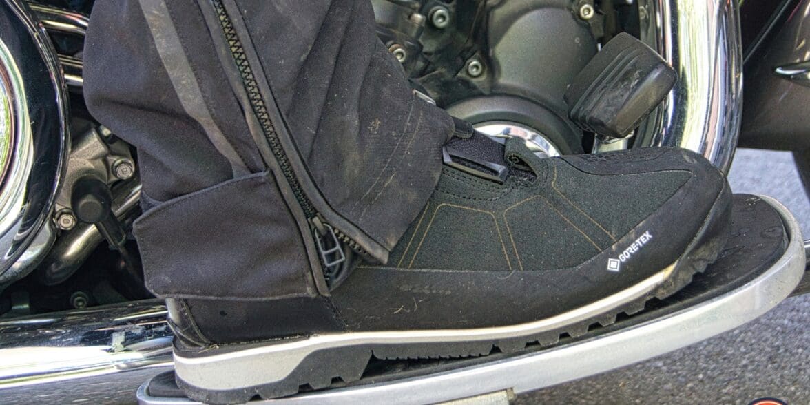 Side vide of REV'IT Pioneer GTX Boot on motorcycle floorboard