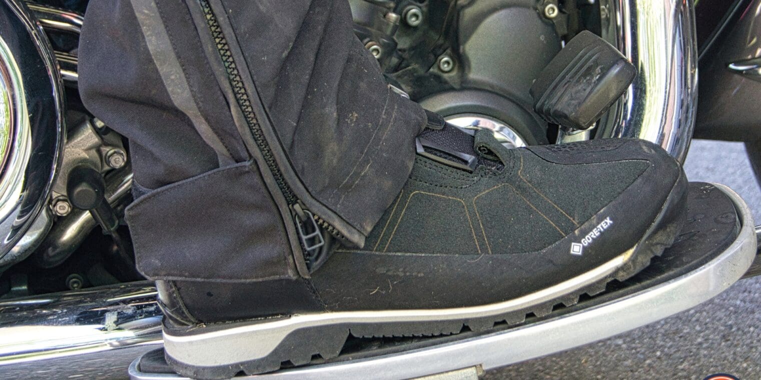 Side vide of REV'IT Pioneer GTX Boot on motorcycle floorboard