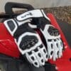 Raven Moto Storm Gloves on red motorcycle