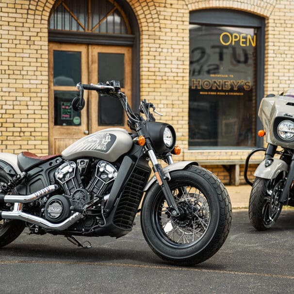 A series of Indian bikes at a pizzeria. Media sourced from Rider Magazine.