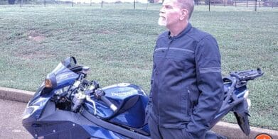 Author wearing Scorpion Cargo Air Jacket next to Triumph motorcycle