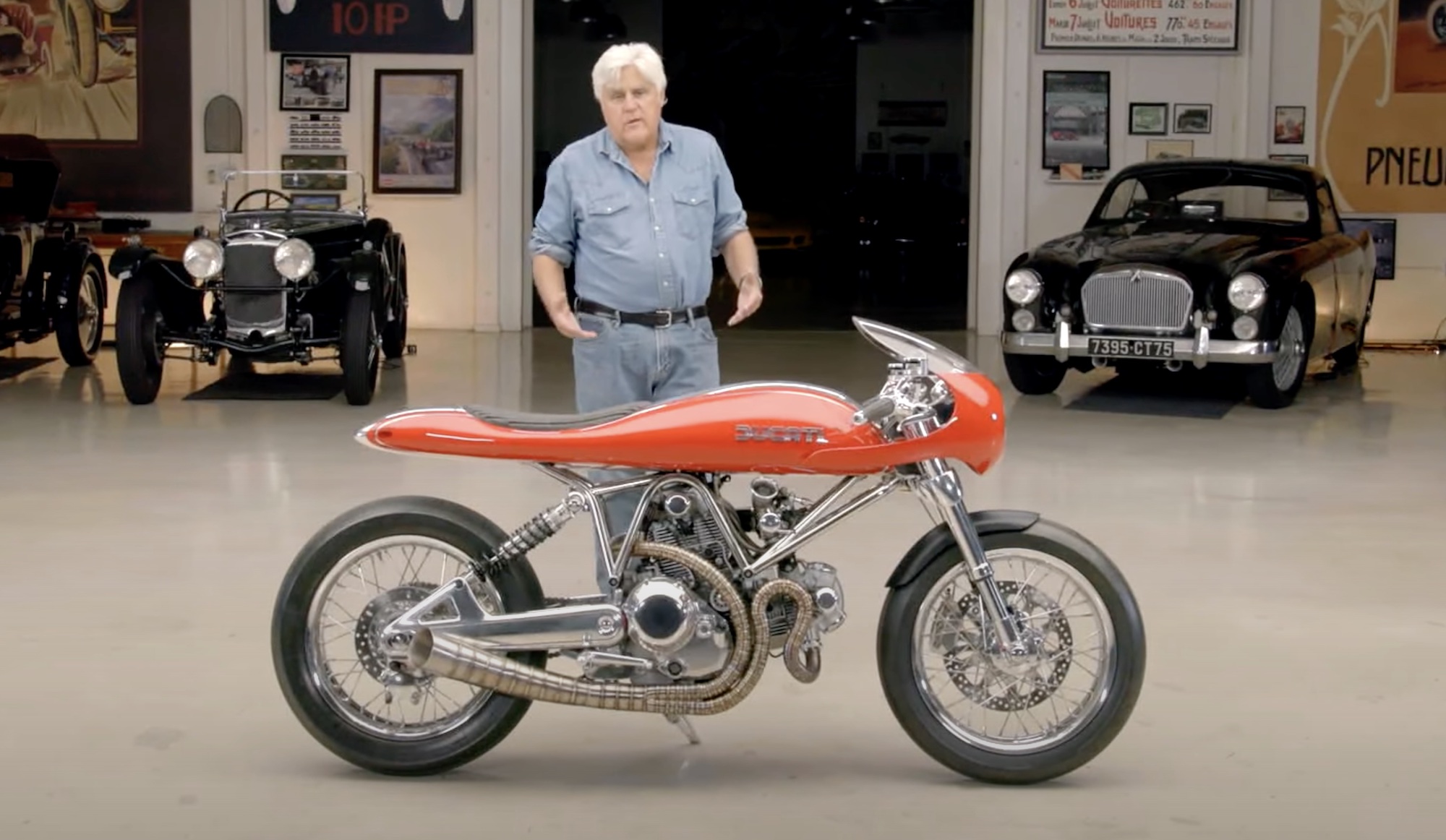 The Revival Cycles FUSE, with the bike’s creator (Alan Stulberg, founder of Revival) and owner (Edward Boyd) next to Jay Leno from 'Jay Leno's Garage.' Media sourced from Youtube. 