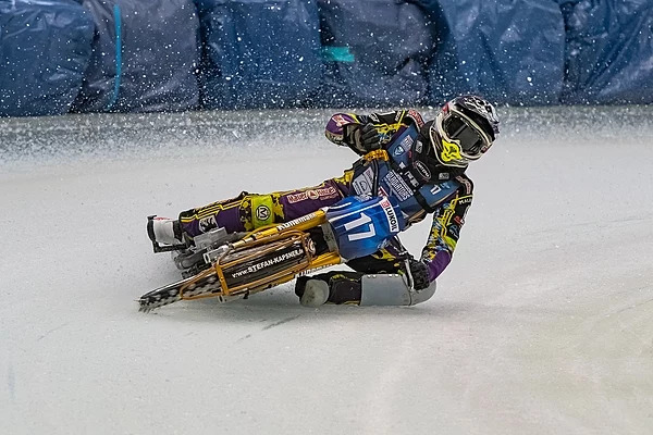 as ice speedway racing motorcycle in action