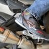 Alpinestars Faster 3 Rideknit shoe on motorcycle peg