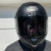 Author wearing Bell Star DLX MIPS helmet with sun visor attached