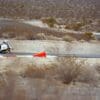 Author sitting on road after low-side motorcycle accident